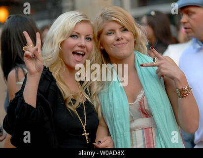 Elisha Cuthbert and her sister Lee-Ann arrive on the red carpet for the MuchMusic Video Awards at the CHUM CityTV headquarters in Toronto, Canada on June 18, 2006. (UPI Photo/Christine Chew) Stock Photo