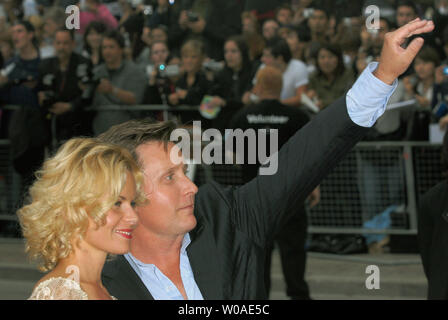 Actor, director and writer Emilio Estevez, accompanied by his fiancee Sonia Magdevski, waves to fans gathered across the street from Roy Thomson Hall at the North American premiere of 'Bobby' during the Toronto International Film Festival in Toronto, Canada on September 14, 2006.  (UPI Photo/Christine Chew) Stock Photo