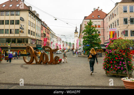 WURZBURG, GERMANY - JUNE 12, 2019: Main street of the city, in the background the town hall Stock Photo