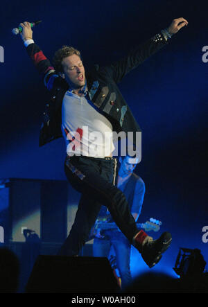 Coldplay frontman Chris Martin performs during the first of two sold-out concerts at the Air Canada Center on the first leg of the band's 'Vida La Vida' world tour stop in Toronto, Canada on July 30, 2008. (UPI Photo/Christine Chew) Stock Photo