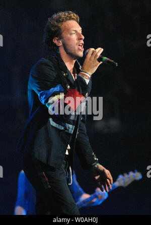Coldplay frontman Chris Martin performs during the first of two sold-out concerts at the Air Canada Center on the first leg of the band's 'Vida La Vida' world tour stop in Toronto, Canada on July 30, 2008. (UPI Photo/Christine Chew) Stock Photo