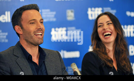 Actor and director Ben Affleck (L) and actress Rebecca Hall  attend the Toronto International Film Festival press conference for 'The Town' at the Hyatt Regency Hotel in Toronto, Canada on September 10, 2010. (UPI / Christine Chew) Stock Photo