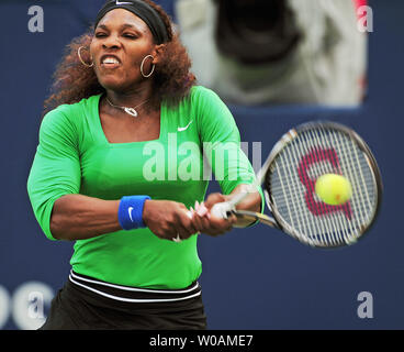 Serena Williams hits a backhand return en route to winning her second round match 6-1, 7-6 over Germany's Julia Goerges in Rogers Cup singles action at the Rexall Center in Toronto, Canada on August 10, 2011.  UPI /Christine Chew Stock Photo