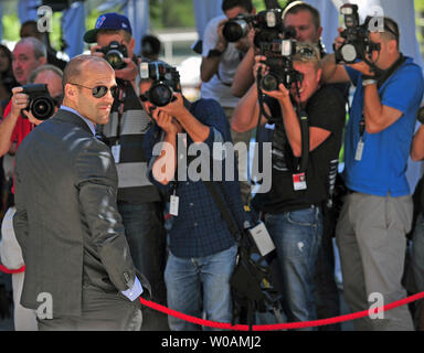 Actor Jason Statham poses for photographers as he arrives for the gala screening of 'Killer Elite' at Roy Thomson Hall during the Toronto International Film Festival in Toronto, Canada on September 10, 2011.  UPI/Christine Chew Stock Photo