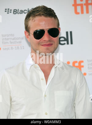 Actor Brady Corbet arrives for the premiere of 'Martha Marcy May Marlene' at Ryerson Theatre during the Toronto International Film Festival in Toronto, Canada on September 11, 2011.  UPI/Christine Chew Stock Photo