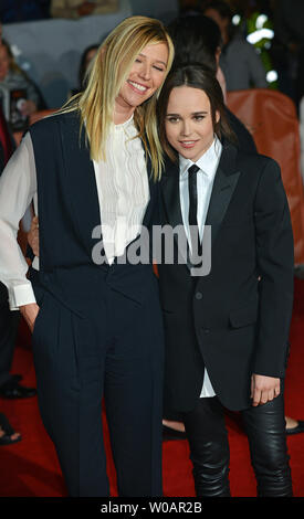 Ellen Page (R) and her girlfriend Samantha Thomas arrive at the world premiere of 'Freeheld' at Roy Thomson Hall during the Toronto International Film Festival in Toronto, Canada on September 13, 2015. Photo by Christine Chew/UPI Stock Photo