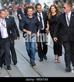 Surrounded by a security team, Matt Damon (in blue jeans) arrives at the Toronto International Film Festival premiere of 'Manchester By The Sea' at the Princess of Wales Theatre in Toronto, Canada on September 13, 2016. Photo by Christine Chew/UPI Stock Photo