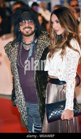 Motley Crue's Nikki Sixx and his wife Courtney Sixx attend the world