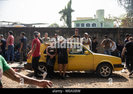 Migrants, mainly Cubans wait in front of INM's Regional Sub-delegation office to discuss having the proper paperwork in Tapachula, Mexico  on May 6, 2019.     Some migrants enter Mexico at this southern border town and then travel freely north to the United States border.     Photo by Ariana Drehsler/UPI Stock Photo
