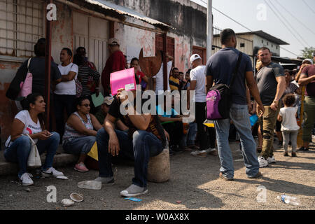 Migrants, mainly Cubans wait in front of INM's Regional Sub-delegation office to discuss having the proper paperwork in Tapachula, Mexico  on May 6, 2019.     Some migrants enter Mexico at this southern border town and then travel freely north to the United States border.     Photo by Ariana Drehsler/UPI Stock Photo