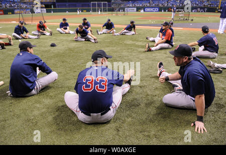 Boston Red Sox catcher Jason Varitek (33) stretches with his teammates during warm-ups prior to the first game of the American Leage Championship Series against the Tampa Bay Rays at Tropicana Field in St. Petersburg, Florida on October 10, 2008.  (UPI Photo/Kevin Dietsch) Stock Photo