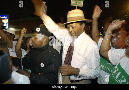 Former DC Mayor Marion Barry greets supporters as he arrives at a victory party in Southeast Washington, DC. Barry claimed victory over incumbent Sandy Allen during the primary for the DC City Council Ward 8 seat. Washington, DC. Tuesday, September 14, 2004 ( Jessica Tefft / The Washington Times  ) Stock Photo
