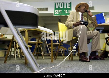Former DC Mayor Marion Barry takes a phone call at his campaign headquarters in Southeast Washington, DC, Wednesday, September 15, 2004. Barry claimed victory over incumbent Sandy Allen during the primary for the DC City Council Ward 8 seat.  ( Jessica Tefft / The Washington Times  ) Stock Photo
