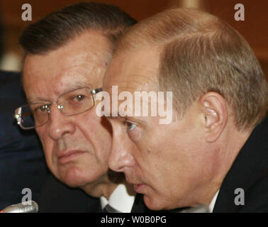 Russian President Vladimir Putin (R) and Prime Minister Viktor Zubkov attend the state council meeting   in Ufa, capital of the Russian province of Bashkortostan in the Volga River region, about 1,200 kilometers (750 miles) east of Moscow on October 11, 2007. (UPI Photo/Anatoli Zhdanov) Stock Photo