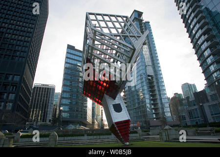 Device to Root out Evil in context. A sculpture of an upside down red ...