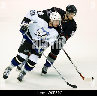 Tampa Bay Lightning Vaclav Prospal (20) and Ruslan Fedotenko (17) join in  the celebration after Vincent Lecavalier scores a goal during the third  period at the Continental Airlines Arena in East Rutherford