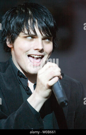 Lead singer Gerard Way of the rock band My Chemical Romance (commonly  abbreviated to MCR) is shown performing on stage during a live concert  appearance Stock Photo - Alamy