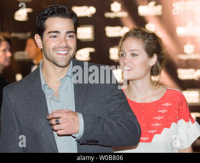 Actor Jesse Metcalfe from 'Desperate Housewives' with actress Erika Christensen ('Six Degrees', 'Traffic') arrives on the red carpet for the Insight Film Sudios event at the Edgewater Casino in Vancouver, British Columbia, September 27, 2008 during the Vancouver International Film Festival. According to 'The Province' newspaper the pair are spending considerable time together off the set which helps them in their roles as parents in the Robe Lieberman directed thriller 'The Tortured' which wraps a month-long shoot in Vancouver and hits theaters next year.   (UPI Photo/Heinz Ruckemann) Stock Photo