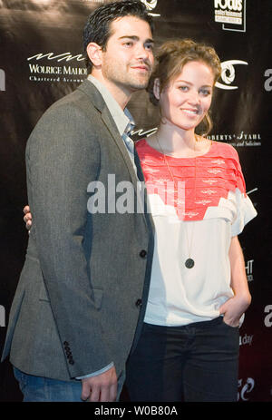 Actor Jesse Metcalfe from 'Desperate Housewives' with actress Erika Christensen ('Six Degrees', 'Traffic') arrives on the red carpet for the Insight Film Sudios event at the Edgewater Casino in Vancouver, British Columbia, September 27, 2008 during the Vancouver International Film Festival. According to 'The Province' newspaper the pair are spending considerable time together off the set which helps them in their roles as parents in the Robe Lieberman directed thriller 'The Tortured' which wraps a month-long shoot in Vancouver and hits theaters next year.   (UPI Photo/Heinz Ruckemann) Stock Photo