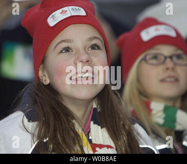 School children participate in the unveiling of the Olympic Torch and Torchbearer uniforms in Whistler Village, February 12, 2009, one year before the start of the Vancouver 2010 Winter Olympic Games in Vancouver, British Columbia. (UPI Photo/Heinz Ruckemann) Stock Photo