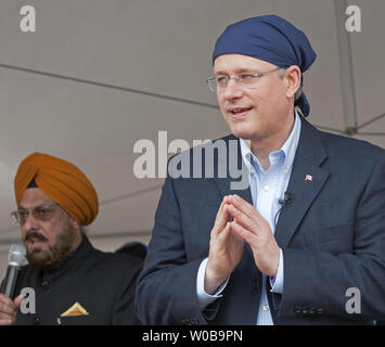 Laureen, the wife of Canada's Conservative Prime Minister Stephen Harper  gets off the campaign bus to join her husband as they visit Vaisaikhi  celebrations on a 2011 Federal Election Campaign stop in