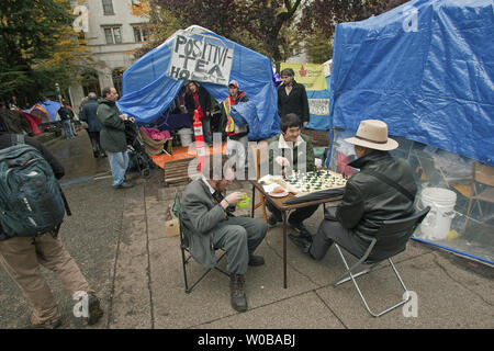 The 'Occupy Vancouver' tent city grows in size during it's two week existence at the Vancouver Art Gallery in downtown Vancouver, British Columbia, October 29, 2011, two days before Halloween.   UPI/Heinz Ruckemann Stock Photo