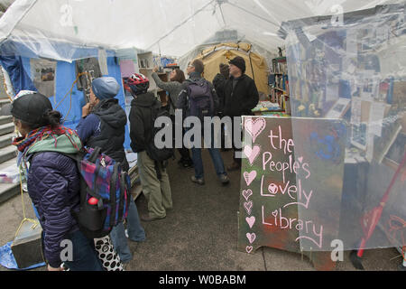 The 'Occupy Vancouver' tent city grows in size during it's two week existence at the Vancouver Art Gallery in downtown Vancouver, British Columbia, October 29, 2011, two days before Halloween.   UPI/Heinz Ruckemann Stock Photo