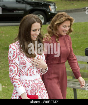 Prince William's wife Kate, the Duchess of Cambridge walks with Canadian Prime Minister Justin Trudeau's wife Sophie Gregoire as they visits the Kitsilano Coast Guard Station during the 2016 Royal tour of British Columbia and the Yukon, Vancouver, British Columbia, September 25, 2016. UPI/Heinz Ruckemann Stock Photo