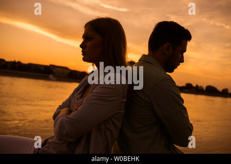 Young couple having troubles in their relationship. Stock Photo