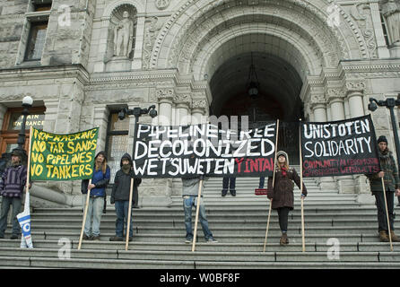 First Nations join thousands of citizens on the front lawns of the British Columbia (BC) Legislature in downtown Victoria, BC, October 22, 2012 to protest against the building of Enbridge Northern Gateway oil pipeline.  UPI/Heinz Ruckemann Stock Photo