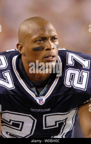 Dallas running back Eddie George escapes the grasp of a Detroit defender  during Cowboys-Lions game Oct. 31 in Irving, TX. The Cowboys defeated the  Lions 31-21. (UPI Photo/Ian Halperin Stock Photo 