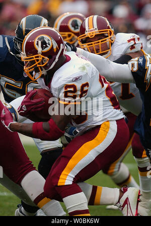 Washington Redskins Clinton Portis (26) scores a touchdown as he gets ...