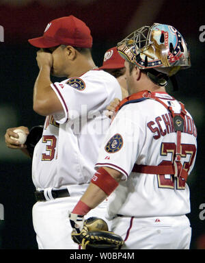 The Philadelphia Phillies Mike Lieberthal (24) comes in to score and is  congratulated by Philadelphia Phillies Pat Burrell after hitting a two run  home run in the fourth inning against the Washington Nationals Tony Armas  on August 29, 2006 at RFK Stadi