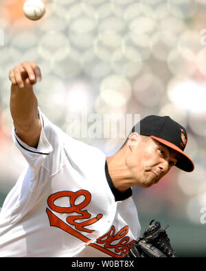 Baltimore Orioles starter Jeremy Guthrie (46) gets a fresh baseball as ...