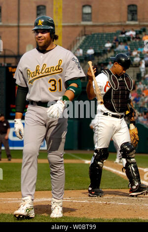 Mike Piazza of the Oakland Athletics looks on in batting practice