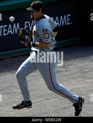 San Francisco Giants first baseman Rich Aurilia cannot come up with a foul ball off the bat of Washington Nationals shortstop Felipe Lopez in the sixth inning on September 2, 2007 at RFK Stadium in Washington.  The Nationals defeated the Giants 2-1.  (UPI Photo/Mark Goldman) Stock Photo