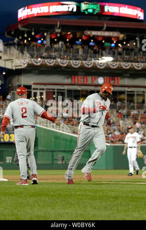 The Philadelphia Phillies Mike Lieberthal (24) comes in to score and is  congratulated by Philadelphia Phillies Pat Burrell after hitting a two run  home run in the fourth inning against the Washington Nationals Tony Armas  on August 29, 2006 at RFK Stadi