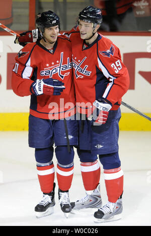 Washington Capitals right wing Matt Bradley (10) is congratulated by Dave Steckel (39) after scoring a goal against the New Jersey Devils in the 1st period at the Verizon Center in Washington on December 26,  2009.   UPI/ Mark Goldman Stock Photo
