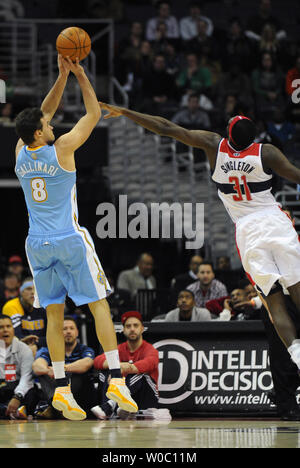 Denver Nuggets small forward Danilo Gallinari (8) scores in the 1st quarter against Washington Wizards small forward Chris Singleton (31) at Verizon Center in Washington, D.C. on January 20,  2012.  UPI / Mark Goldman Stock Photo