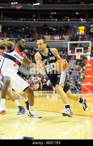 San Antonio Spurs shooting guard Manu Ginobili (20) dribbles against Washington Wizards small forward Chris Singleton (31) in the first half at the Verizon Center in Washington, D.C. on November 26, 2012.   UPI/Mark Goldman Stock Photo