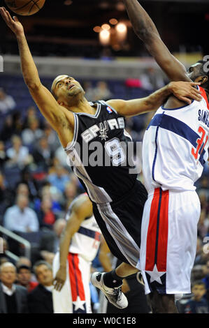 San Antonio Spurs point guard Tony Parker (9) is fouled by Washington Wizards small forward Chris Singleton (31) in the first half at the Verizon Center in Washington, D.C. on November 26, 2012.   UPI/Mark Goldman Stock Photo