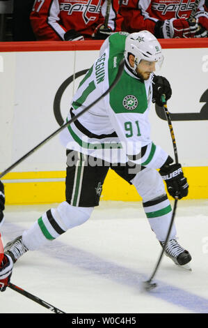 Dallas Stars' Tyler Seguin (91) and Carolina Hurricanes' Brock McGinn ...