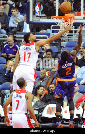 Phoenix Suns guard Eric Bledsoe (2) scores on a fast break against Washington Wizards guard Garrett Temple (17) in the first half at the Verizon Center in Washington, D.C. on December 4, 2015.   Photo by Mark Goldman/UPI Stock Photo