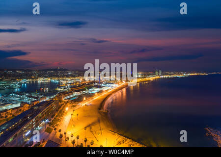 Aerial view of Barcelona Beach in summer night along seaside in Barcelona, Spain. Mediterranean Sea in Spain. Stock Photo