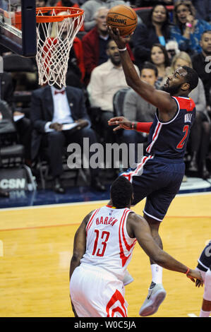 Houston Rockets guard John Wall (1) advances the ball up court against ...