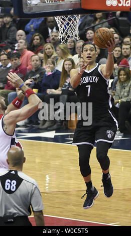 Brooklyn Nets guard Jeremy Lin (7) passes the ball during the first ...