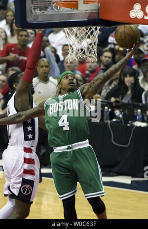 Boston Celtics guard Isaiah Thomas (4) scores against Washington Wizards guard John Wall (2) in the first half at the Verizon Center in Washington, D.C. on May 7, 2017 in the NBA Conference Semifinals.    Photo by Mark Goldman/UPI Stock Photo