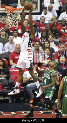 Washington Wizards guard Bradley Beal (3) dunks the ball against Boston Celtics guard Isaiah Thomas (4) in the first half at the Verizon Center in Washington, D.C. on May 7, 2017 in the NBA Conference Semifinals.    Photo by Mark Goldman/UPI Stock Photo