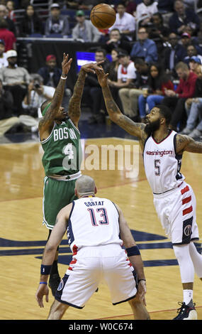 Boston Celtics guard Isaiah Thomas (4) scores against Washington Wizards forward Markieff Morris (5) in the first half at the Verizon Center in Washington, D.C. on May 12, 2017 in game six of the NBA Eastern Conference Semifinals.  Photo by Mark Goldman/UPI Stock Photo