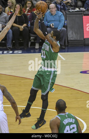 Boston Celtics guard Kyrie Irving (11) defends as Orlando Magic guard ...